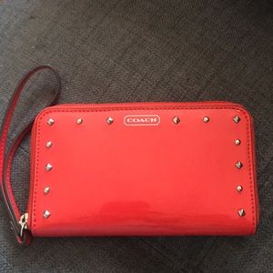Gently used Coach patent leather Red wristlet